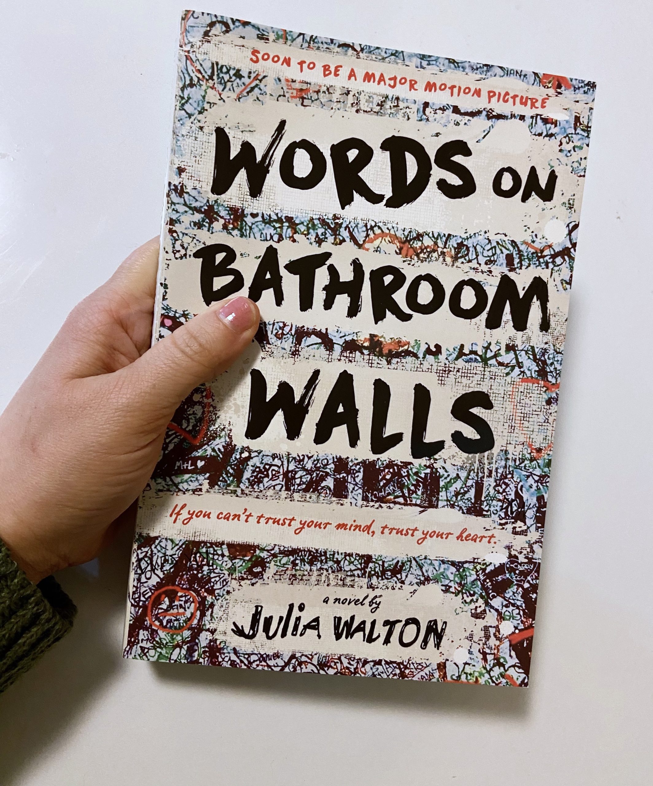 book words on bathroom walls