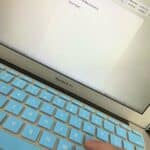laptop with words on the screen